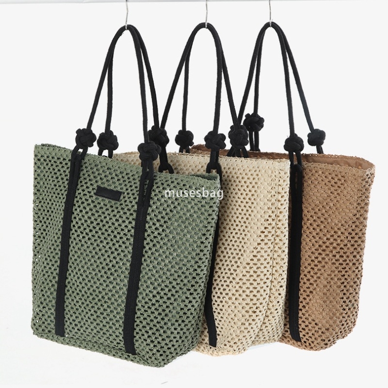 Fashionable women's high-end simple and large capacity single shoulder tote grass woven bag new practical hollow woven bag vacation beach bag ver