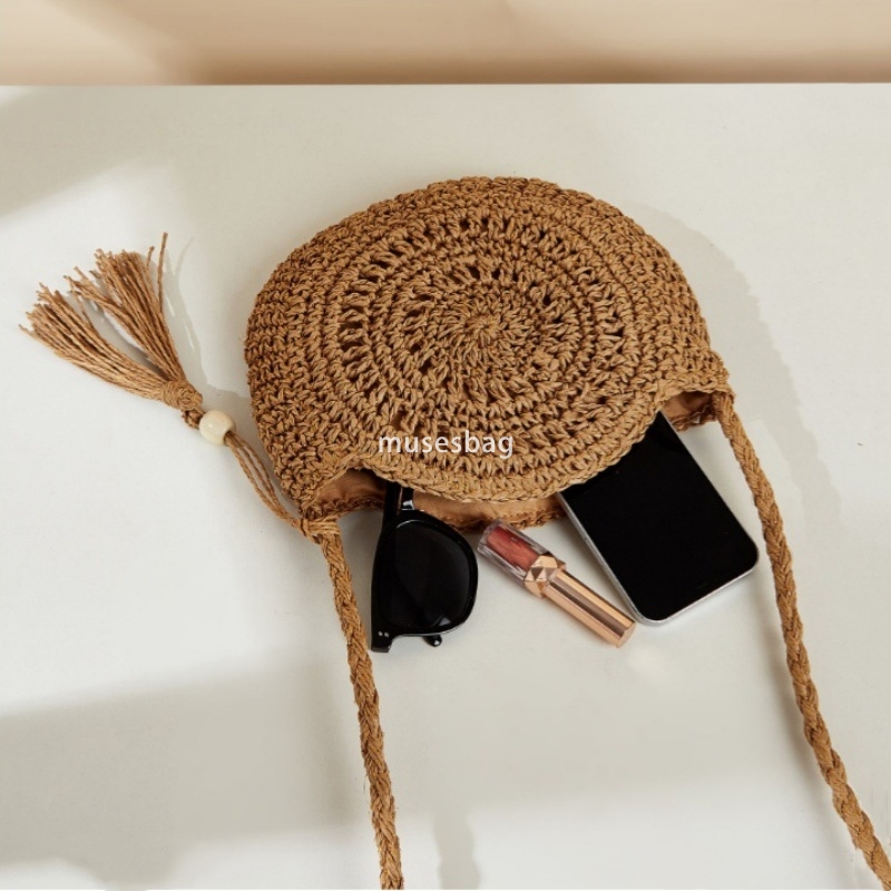 High quality women's designer multifunctional woven artistic forest style grass woven hollow handmade bag with long shoulder strap diagonal cross