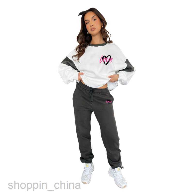 Women Tracksuits Fashionable solid color sports jogging suit Autumn/Winter New Peach Heart Print Color Block Sweater Women's Fashion Casual Pants