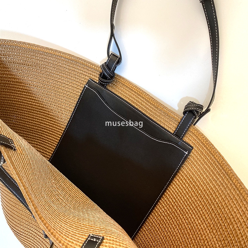 Designer women's high-quality retro practical large capacity handmade trendy woven holiday travel shoulder bag simple and fashionable grass woven