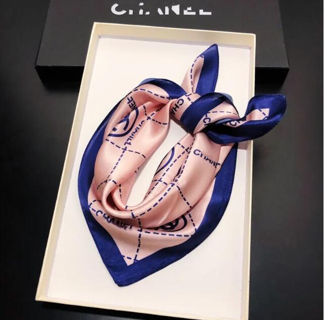 The female designer fashion brand's silk scarf shawl birthday gift is easy to match and has a soft touch