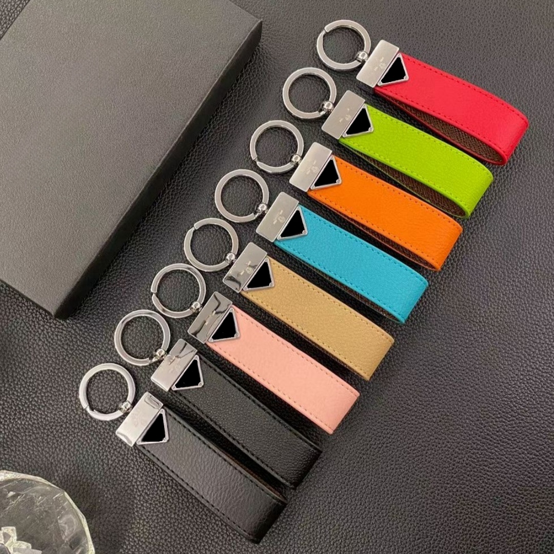 urious Handmade keychains Top quality key chain women men brown keychain leather wallet lanyard plated gold dragonne bag charms designer