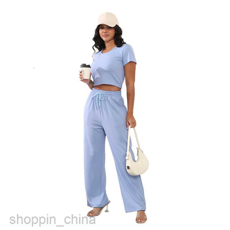 Women Tracksuits Fashionable solid color sports jogging suit Summer New Round Neck Short sleeved Women's Two Piece Fashion Casual Wide Leg Pants 