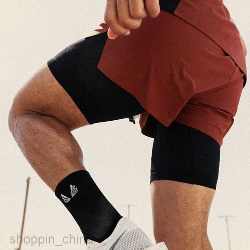Men's Shorts New casual sports shorts for men's quarter pants with elastic double layered running and fitness on all sides
