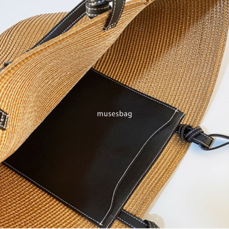 Designer women's high-quality retro practical large capacity handmade trendy woven holiday travel shoulder bag simple and fashionable grass woven