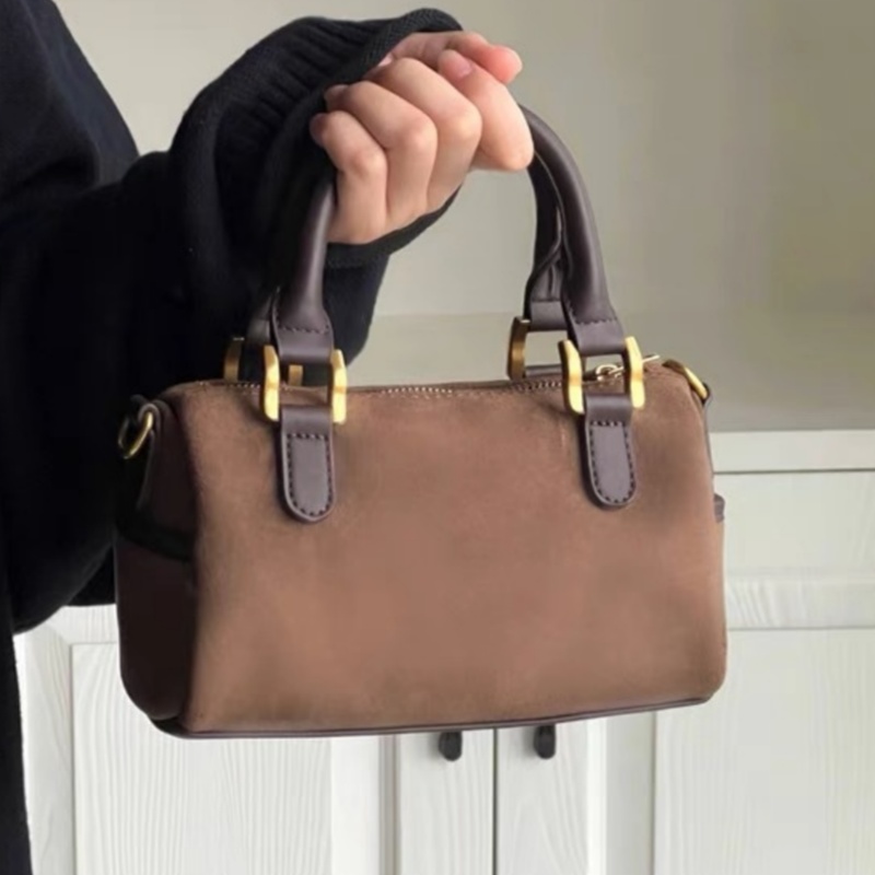 Niche Design Trend Korean Edition Autumn/Winter Bag New Retro Plush Versatile One Shoulder Crossbody Pillow Bag Boston Handheld Women's Bag