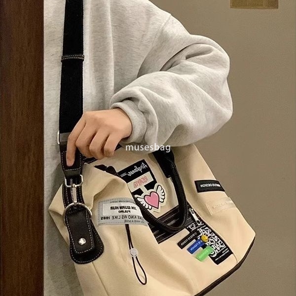 Street trendy women's bag with niche design new retro creative label bag casual commuting canvas crossbody bag tote backpack travel bag