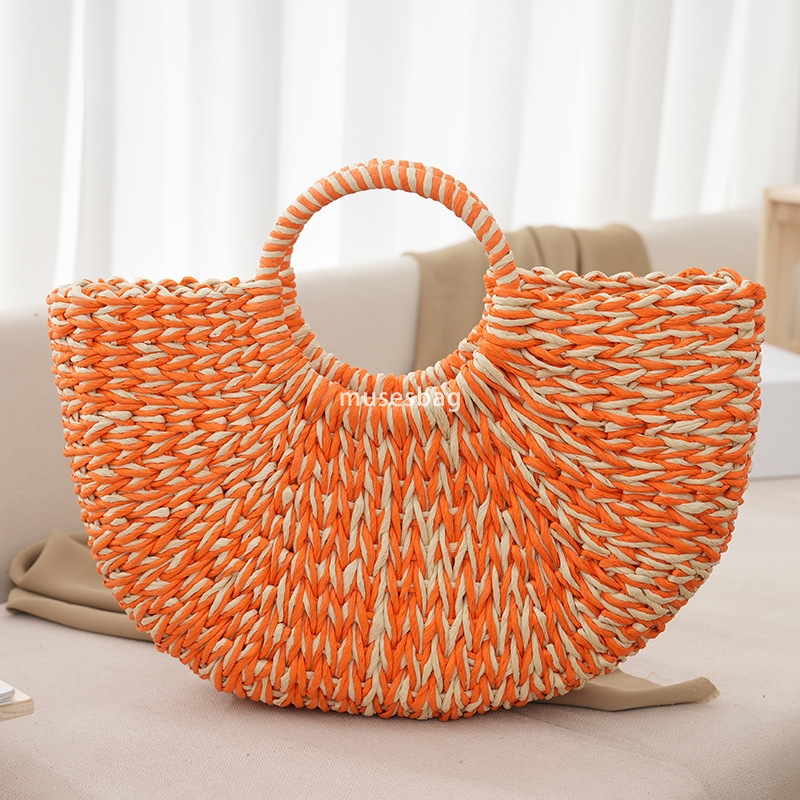 Fashionable women with a sense of luxury high-end large capacity practical temperament solid color handle versatile woven bag vacation beach bag versa