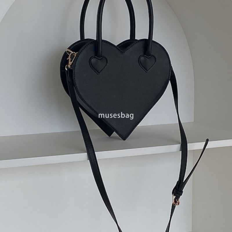 A niche design for street trendy girls a niche love bag a new fashionable and minimalist handbag for women a retro black one shoulder diagonal cross b