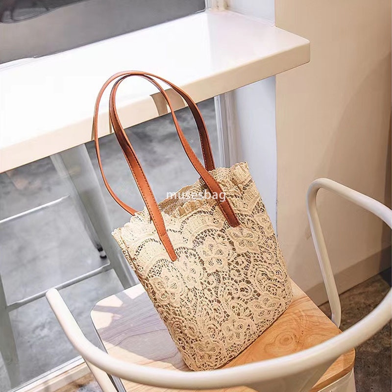 High quality women's designer leisure large capacity spring/summer new grass woven bag lace bucket mother child hollow beach bag cross-border hot