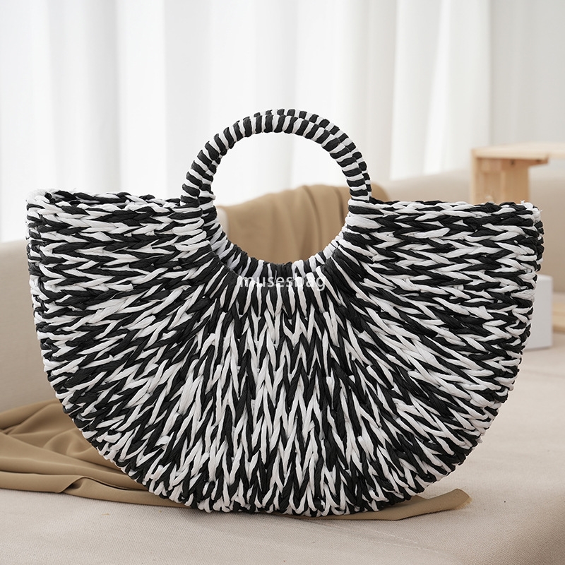 Fashionable women with a sense of luxury high-end large capacity practical temperament solid color handle versatile woven bag vacation beach bag versa