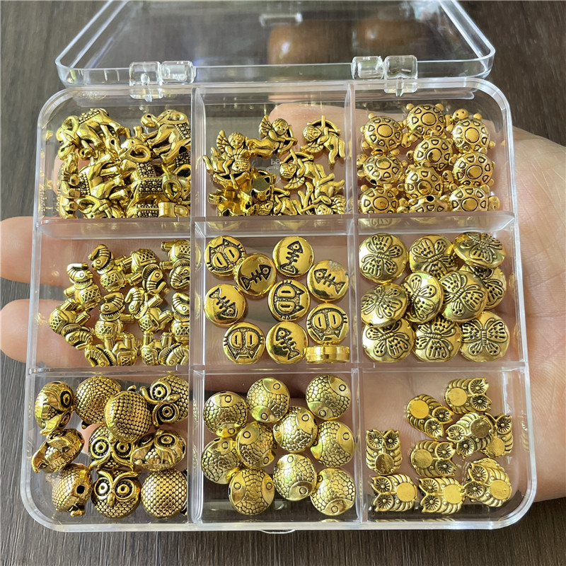 JunKang 90pcs 9 kinds animal series owl fish turtle baby elephant angel butterfly perforated beads DIY bracelet necklace gasket