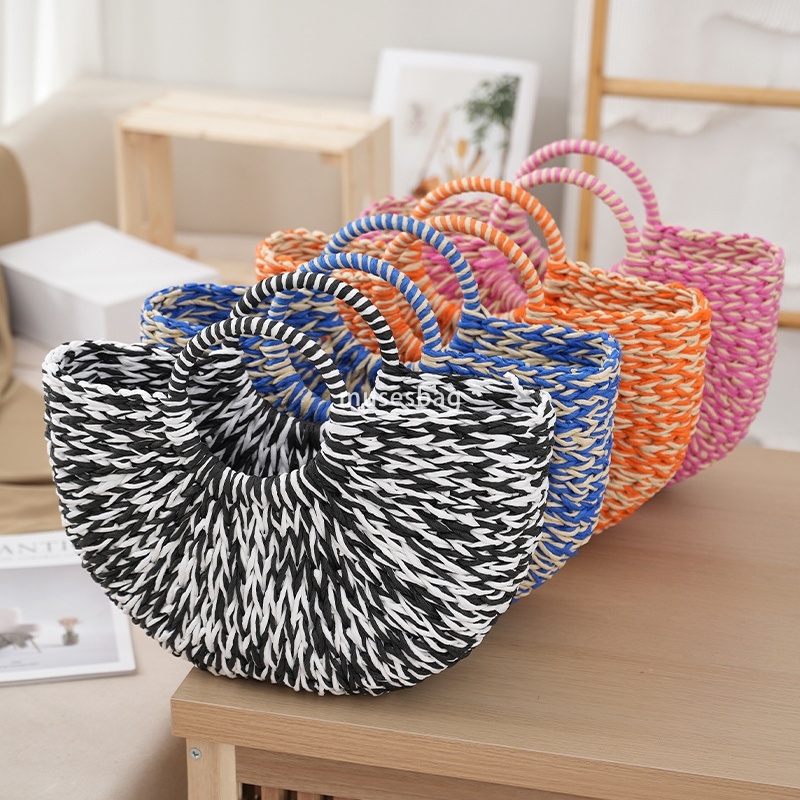 Fashionable women with a sense of luxury high-end large capacity practical temperament solid color handle versatile woven bag vacation beach bag versa