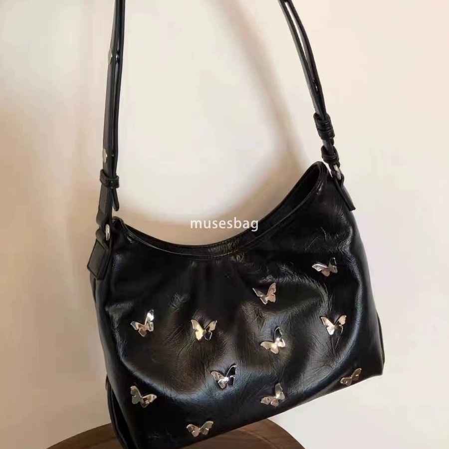 A niche spicy and cool three-dimensional butterfly bag with a new fashionable metal texture handbag light luxury commuting underarm bag