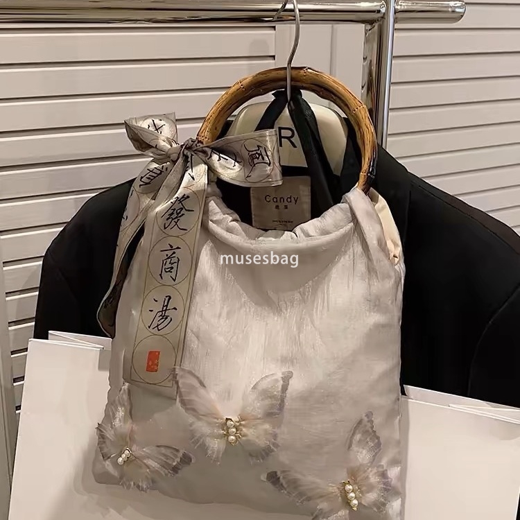 New Chinese style bamboo knot handbag for women's new style matching cheongsam circular ring handbag butterfly tote bag
