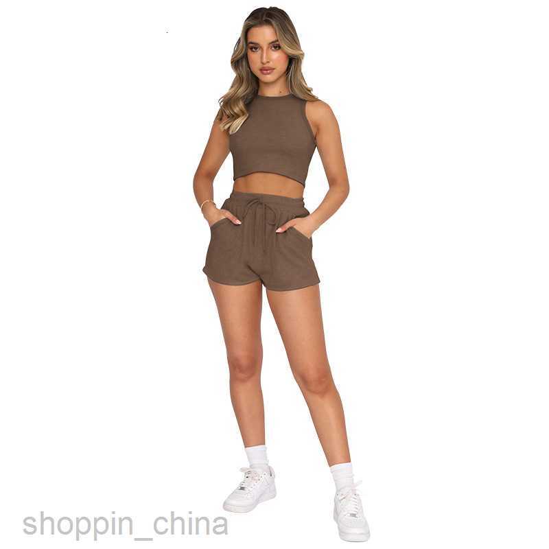 Women's Tracksuits New summer suit solid color vest urban leisure short style sleeveless navel exposed fashion body shaping women's wear Set