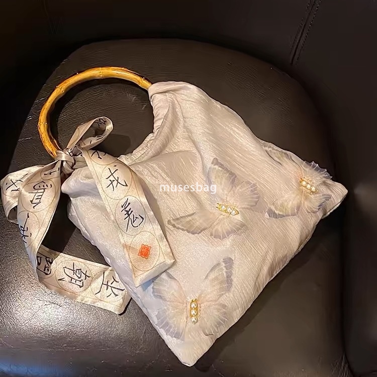 New Chinese style bamboo knot handbag for women's new style matching cheongsam circular ring handbag butterfly tote bag