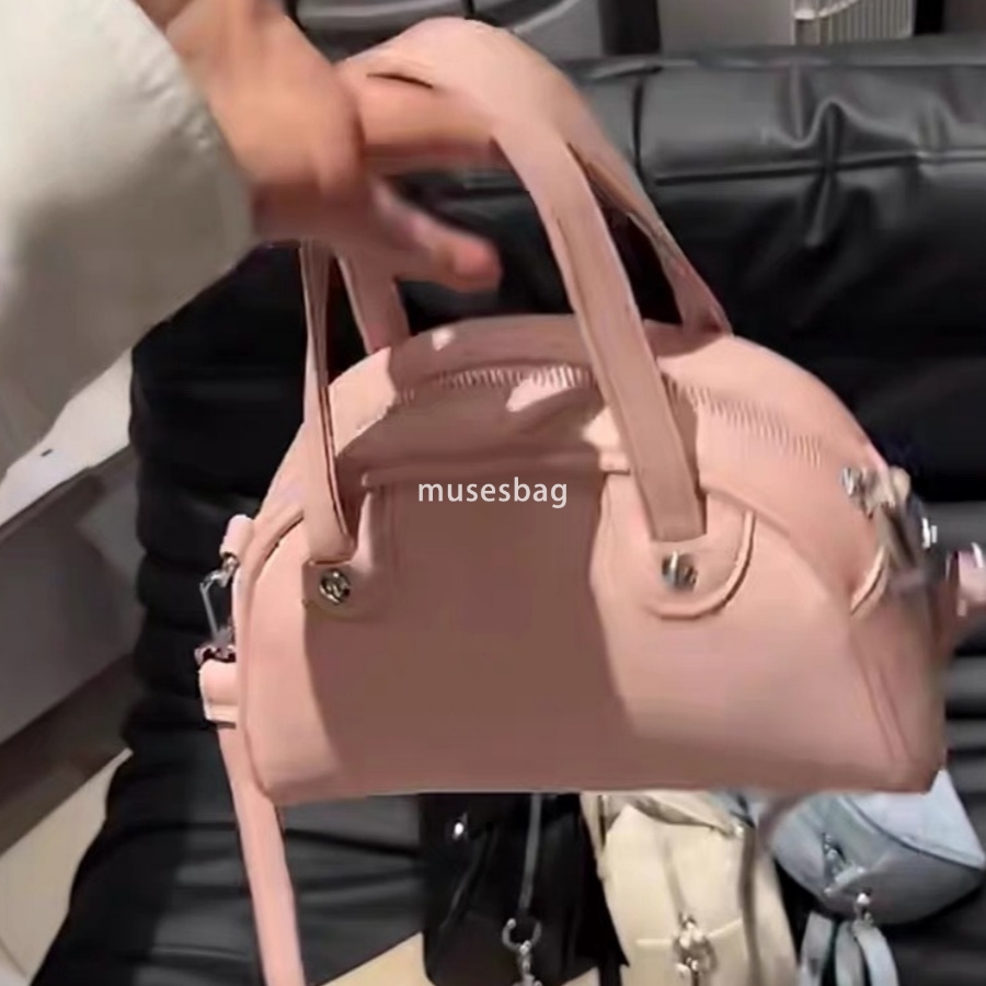 Street trend niche design high-quality soft leather bag women's new cute butterfly design Boston bag high-end feel handheld commuting diagonal cr
