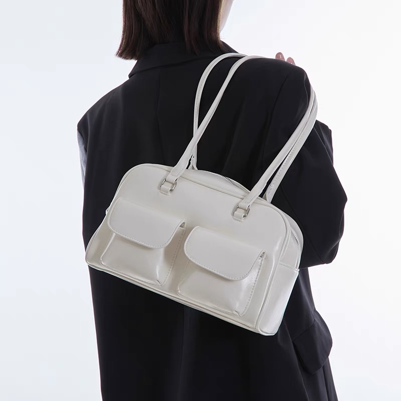 Korean version fashion trend niche design bag women's new high-end feeling ribbon handbag niche versatile commuting shoulder bag
