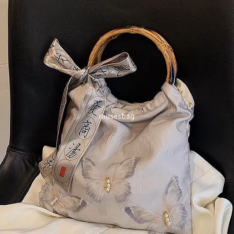 New Chinese style bamboo knot handbag for women's new style matching cheongsam circular ring handbag butterfly tote bag