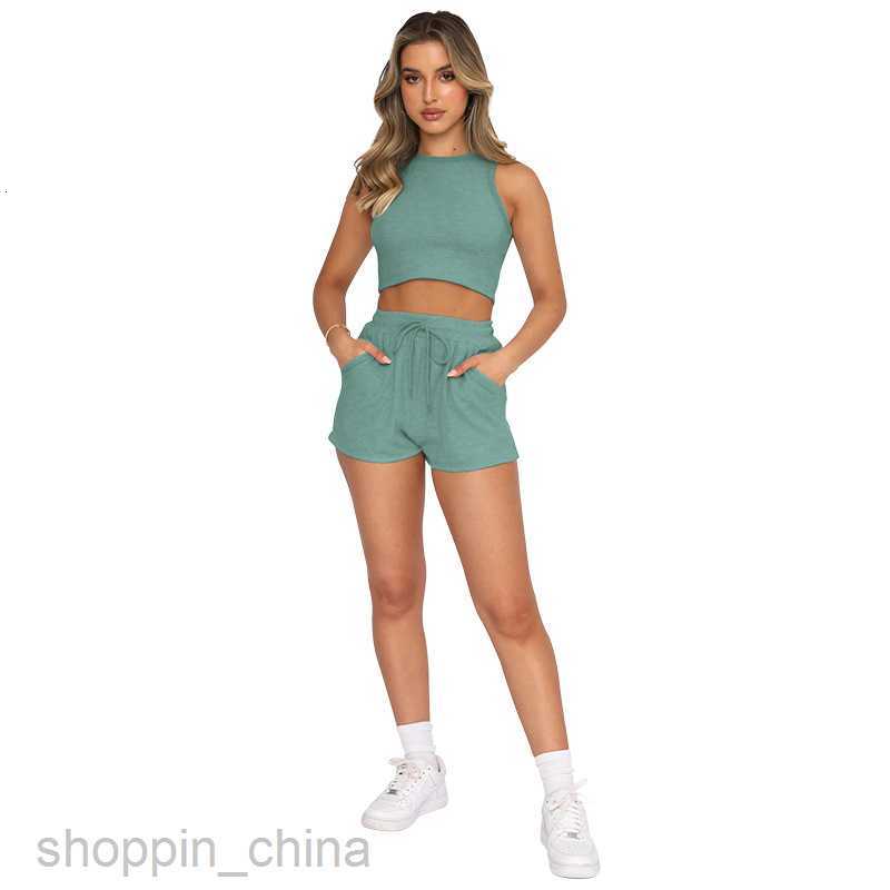 Women's Tracksuits New summer suit solid color vest urban leisure short style sleeveless navel exposed fashion body shaping women's wear Set