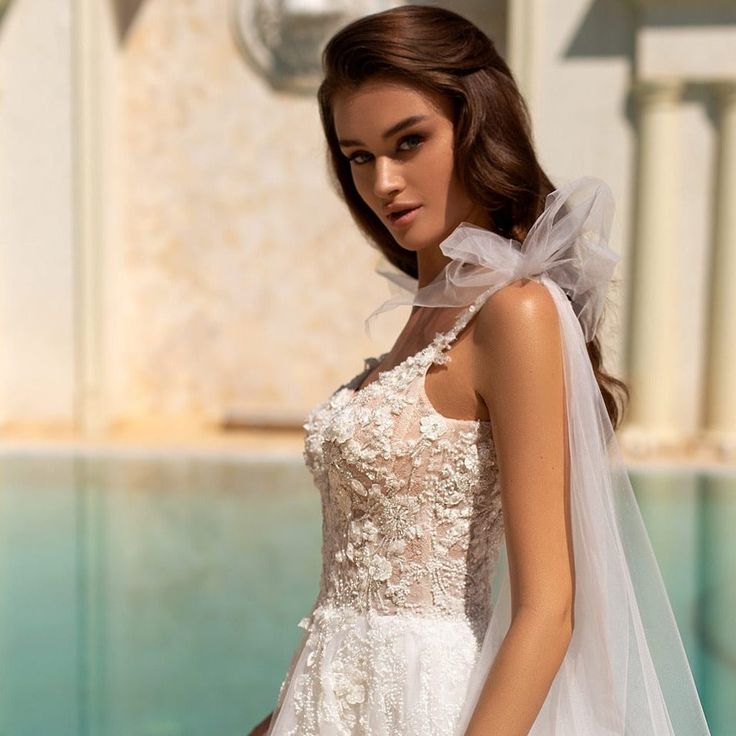 Boho A-line Tulle Wedding Dresses Court Train Spaghetti Straps Sleeveless Sexy Backless Beach Bridal Gowns Lace Appliques Top Ivory Vestidos De Novia