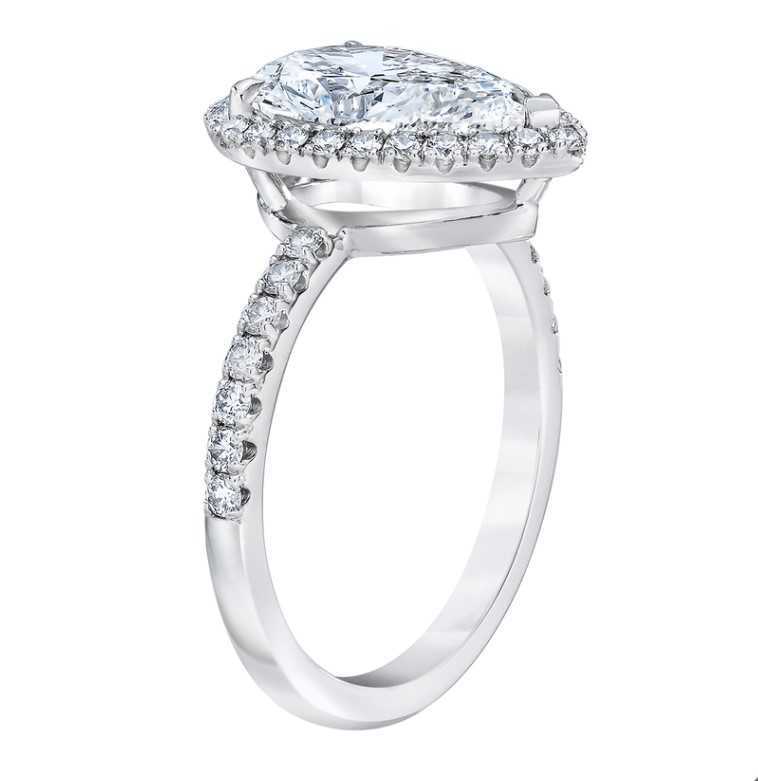 Platinum 3.46ctw Pear and Round Brilliant Cut Moissanite Diamond Ring