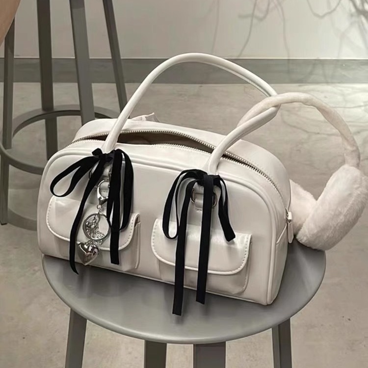 Korean version fashion trend niche design bag women's new high-end feeling ribbon handbag niche versatile commuting shoulder bag
