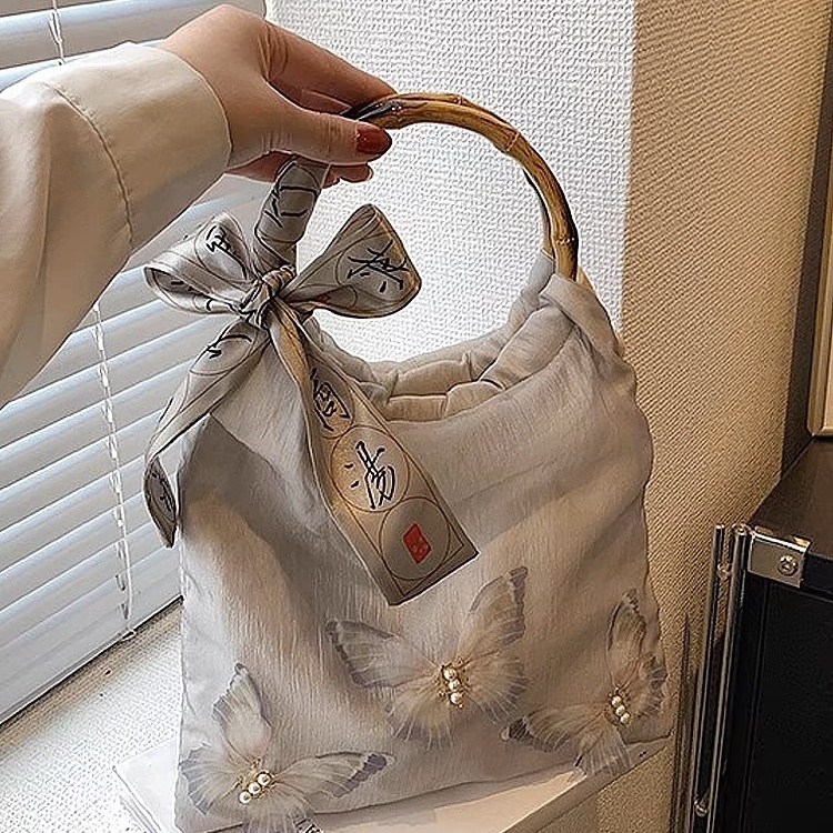 New Chinese style bamboo knot handbag for women's new style matching cheongsam circular ring handbag butterfly tote bag
