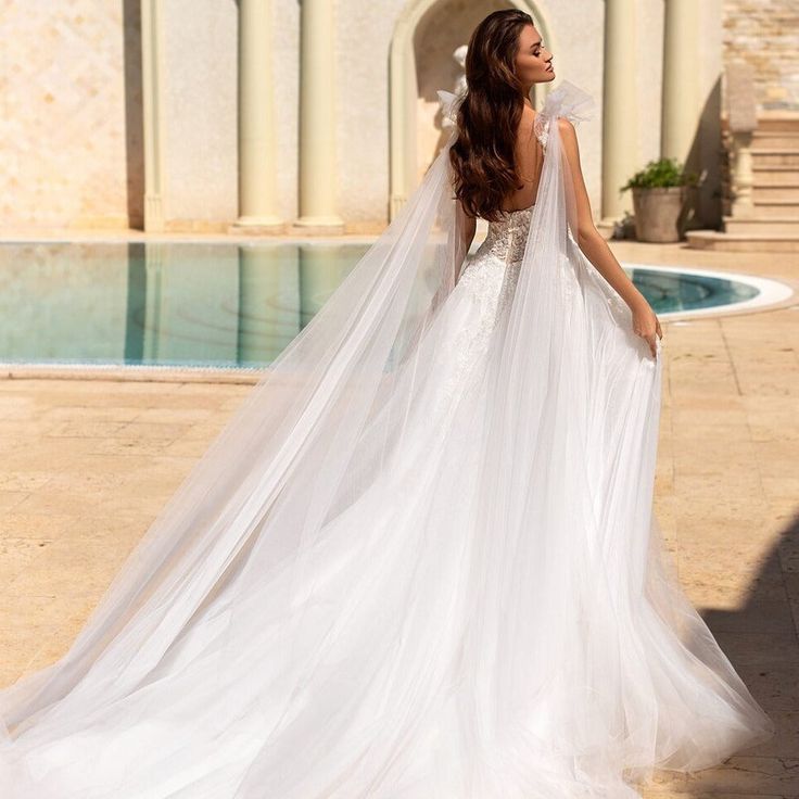 Boho A-line Tulle Wedding Dresses Court Train Spaghetti Straps Sleeveless Sexy Backless Beach Bridal Gowns Lace Appliques Top Ivory Vestidos De Novia