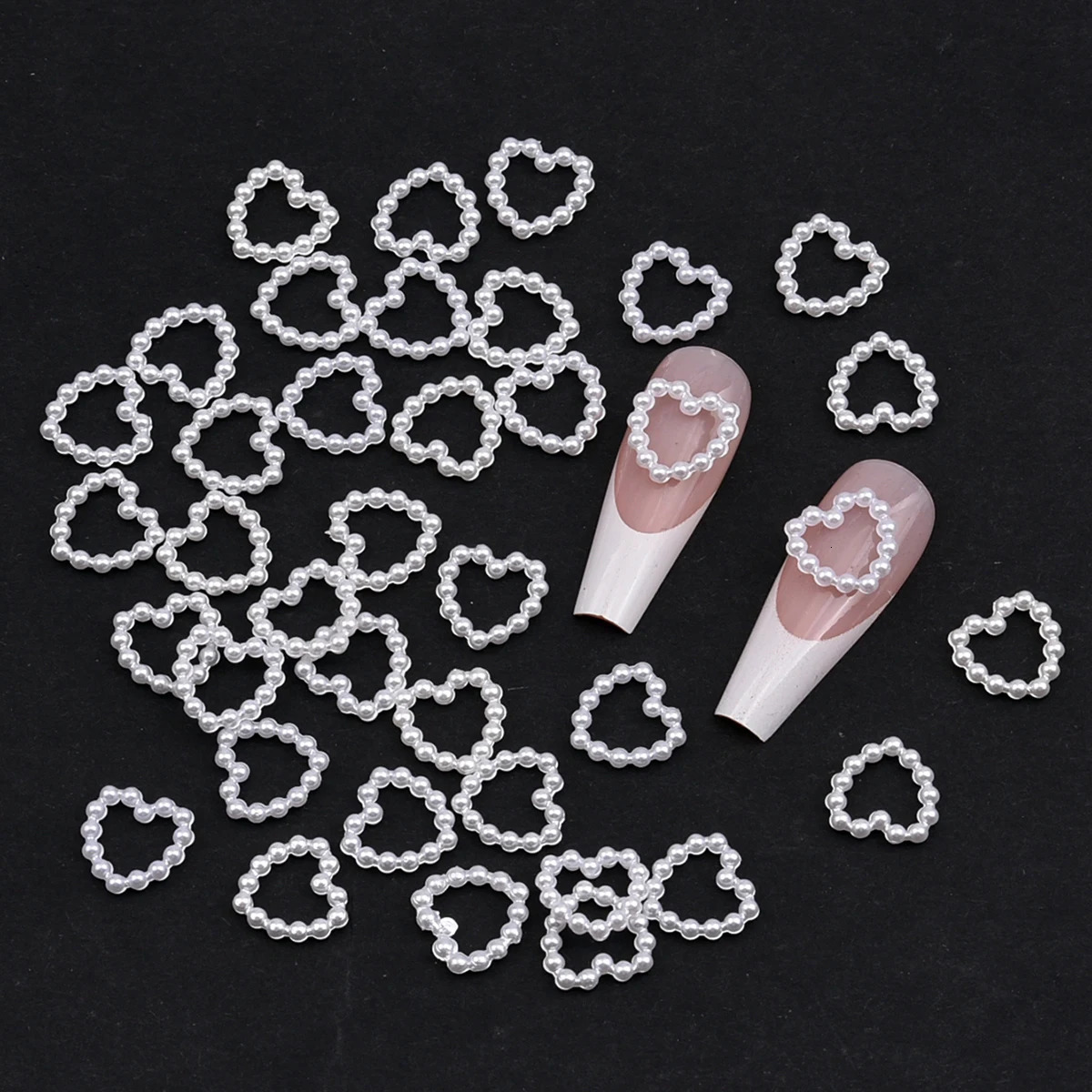 100 pieces of white purple pink heart-shaped pearl nail decoration with hollow charm loose 3D nail art accessories for womens nails NJ23911-6 240625