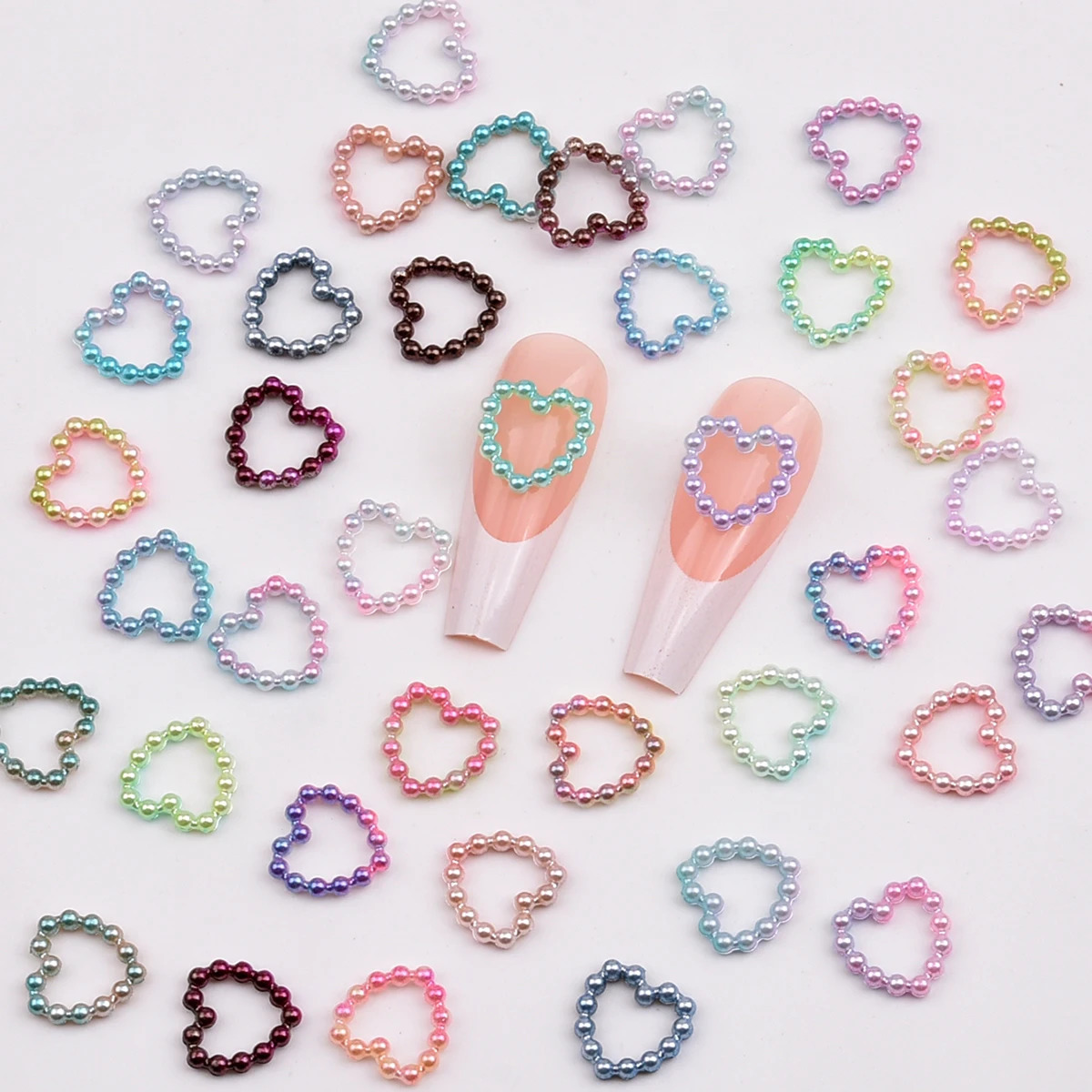 100 pieces of white purple pink heart-shaped pearl nail decoration with hollow charm loose 3D nail art accessories for womens nails NJ23911-6 240625