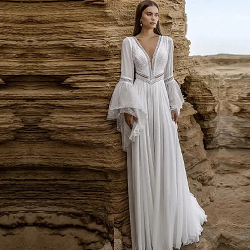 Beach Long Chiffon Wedding Dresses Deep V-Neck Pleats Long Flare Sleeves Boho Bridal Gowns Lace Appliques Backless White Wedding Gown Sweep Train 2024
