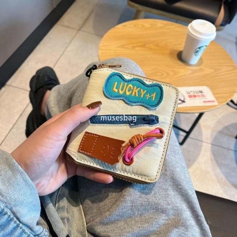 Fashionable women's high-end new Korean version short zipper multi card wallet love niche application practical multi-functional card bag hand-he