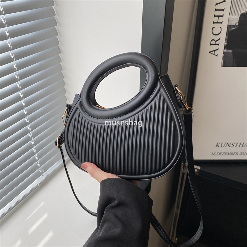 Street trend soft leather pleats personalized trend minimalist ins crossbody bag new spring portable shoulder commuting bag for women