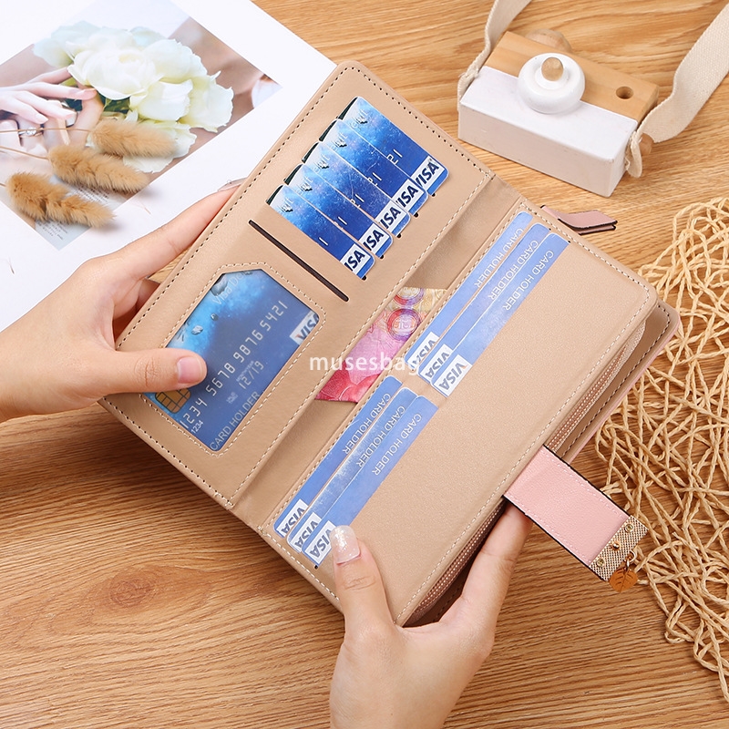 Korean women's high-end feeling new temperament versatile wallet long fashionable handbag hollowed out leaf zipper buckle practical multifunction