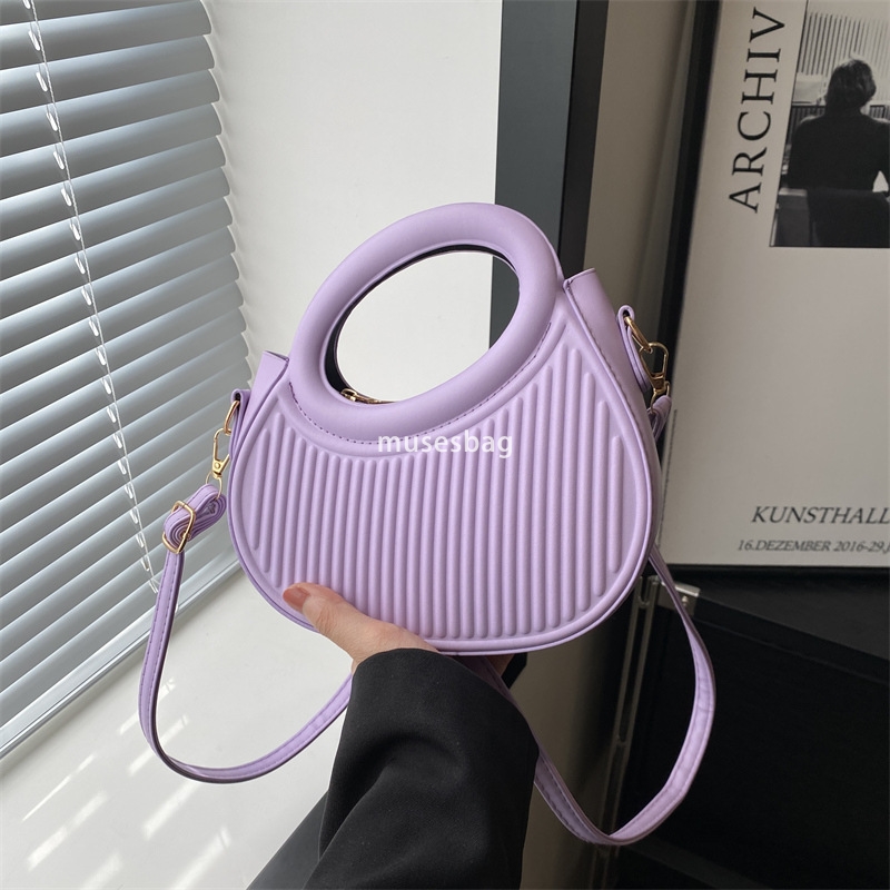 Street trend soft leather pleats personalized trend minimalist ins crossbody bag new spring portable shoulder commuting bag for women