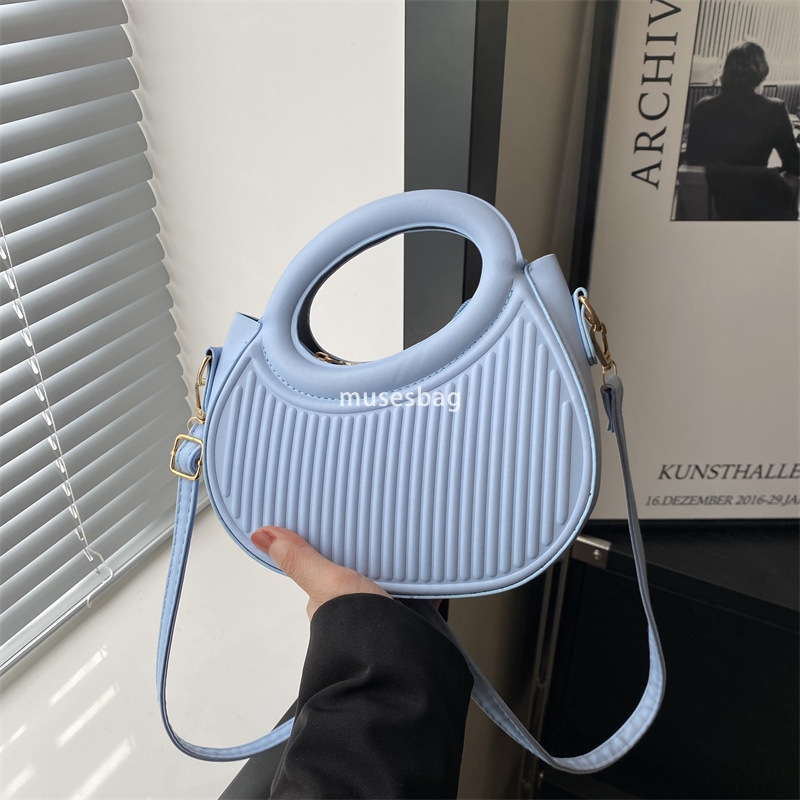 Street trend soft leather pleats personalized trend minimalist ins crossbody bag new spring portable shoulder commuting bag for women