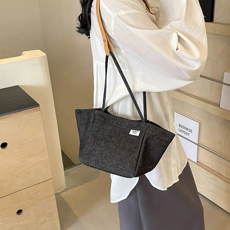 Deformable denim blue shoulder bag for womens 2024 luxury designer wallet and handbag large capacity underarm waist vagabond 240627
