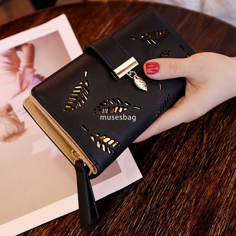 Korean women's high-end feeling new temperament versatile wallet long fashionable handbag hollowed out leaf zipper buckle practical multifunction