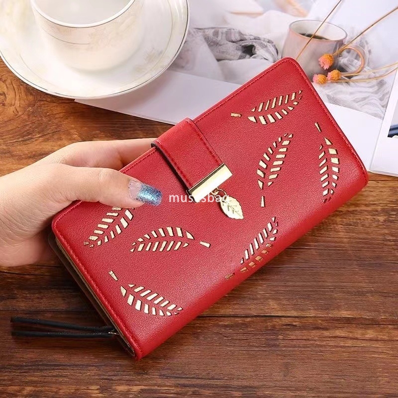 Korean women's high-end feeling new temperament versatile wallet long fashionable handbag hollowed out leaf zipper buckle practical multifunction