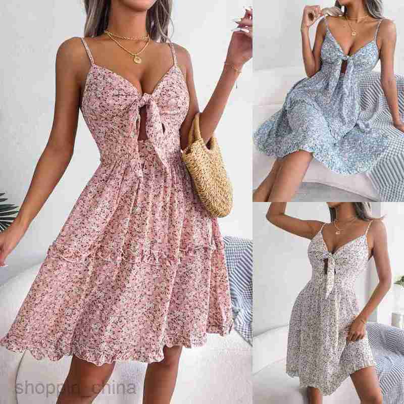 Women Casual Dresses fashion dress Spring and summer broken flower bow V-neck wood ear big swing Dress Holiday suspender skirt women's dress