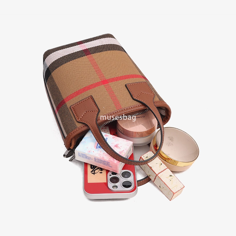 Urban minimalist and niche design vertical square bag women's new canvas plaid leather handbag textured single shoulder crossbody bag commuting b
