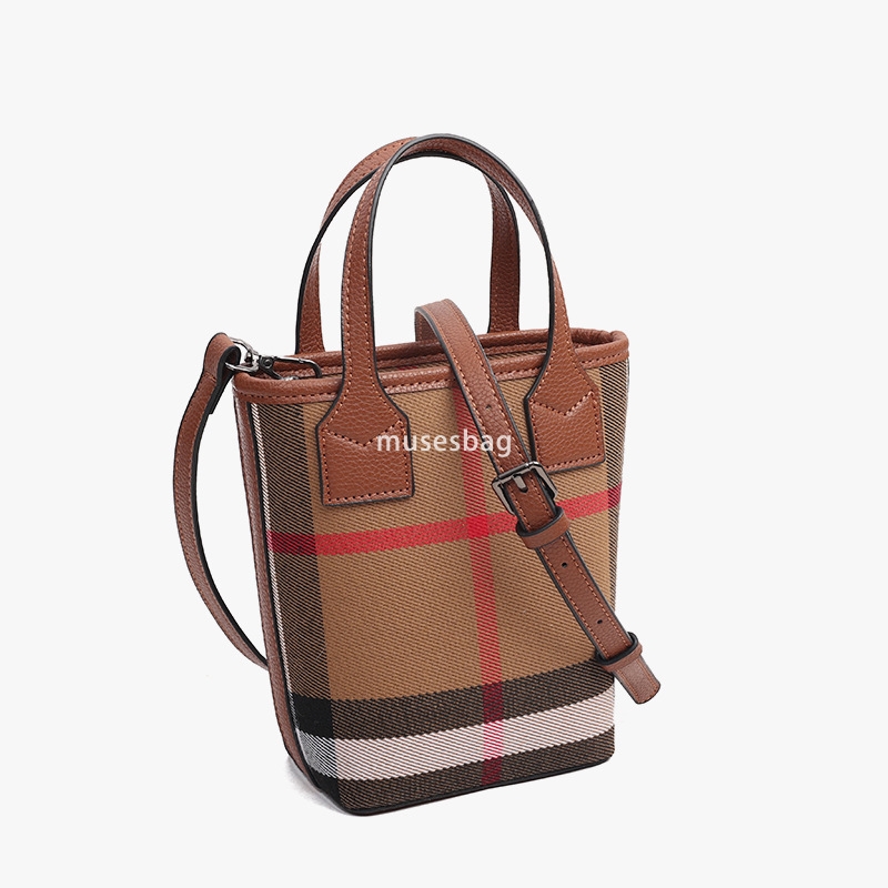 Urban minimalist and niche design vertical square bag women's new canvas plaid leather handbag textured single shoulder crossbody bag commuting b