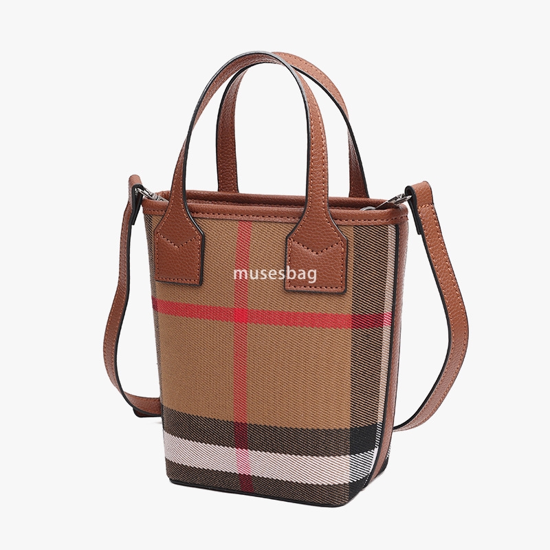 Urban minimalist and niche design vertical square bag women's new canvas plaid leather handbag textured single shoulder crossbody bag commuting b