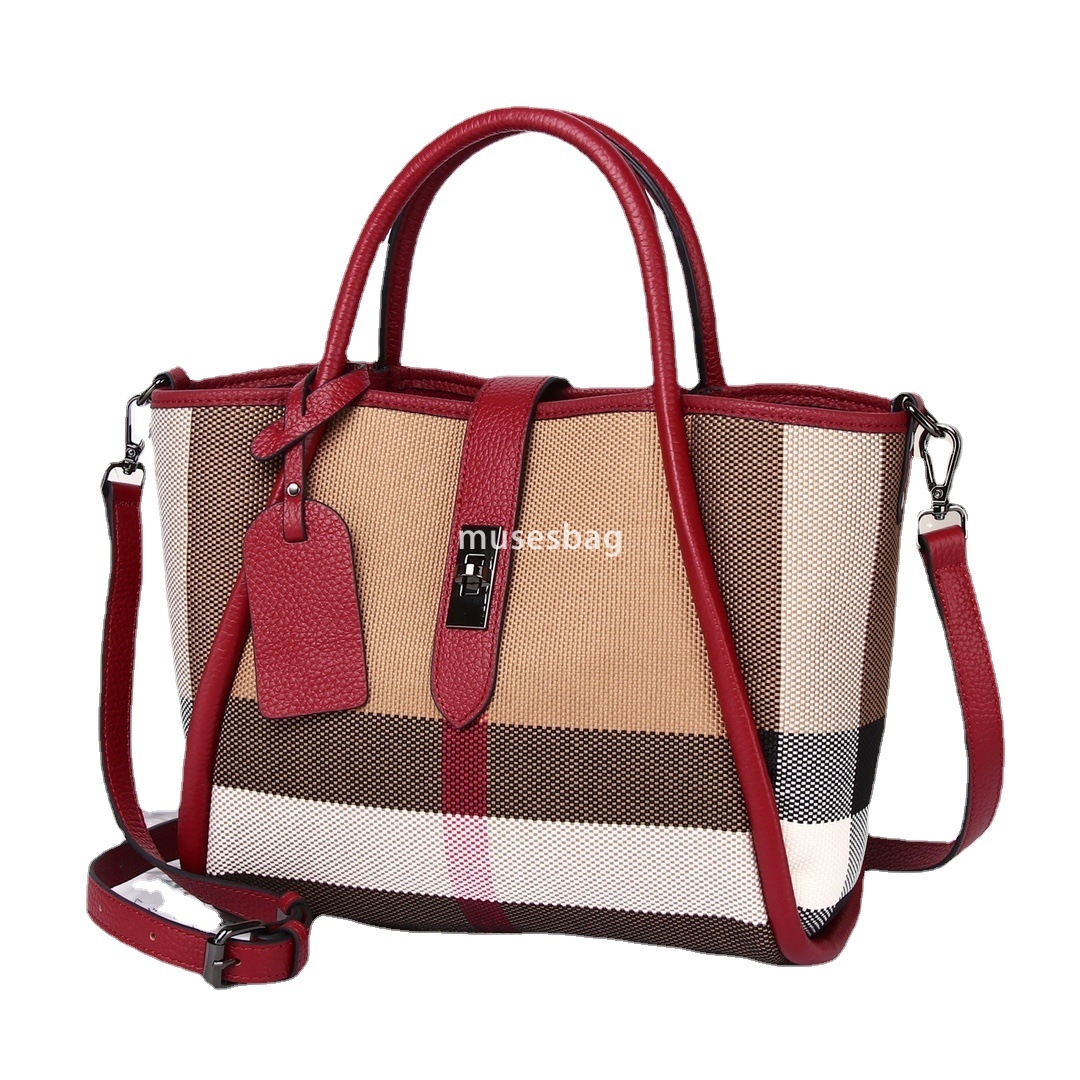 Crowdsourced design street trend contrasting color wing for women new and trendy carrying plaid canvas bag large capacity cowhide handbag 4449 4