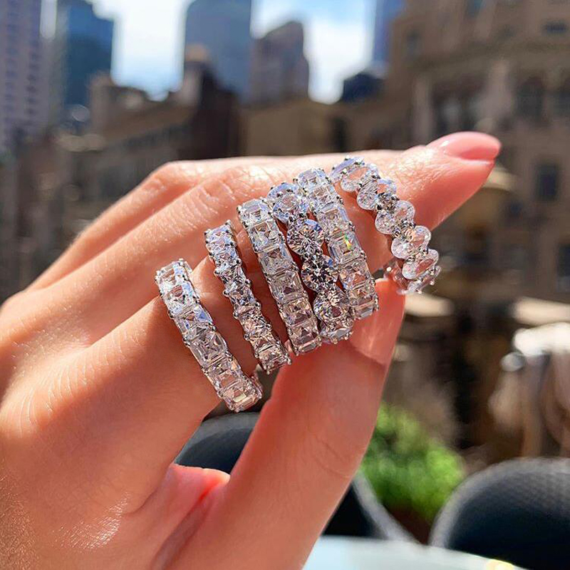 2023 New High Quaity Iced Out Bling 5A Clear Pink CZ Eternity Band Oval Cubic Zirconia Wedding Engagement Ring For Women Jewelry