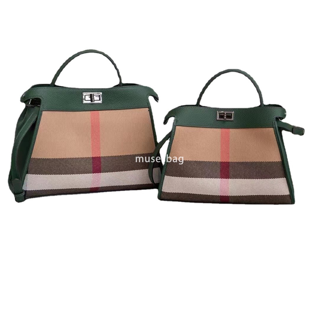 A niche design for European and American retro new styles the same leather canvas contrasting color single shoulder handbag handmade crossbody bag 15d