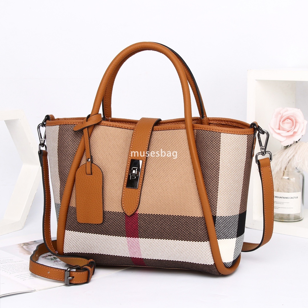 Crowdsourced design street trend contrasting color wing for women new and trendy carrying plaid canvas bag large capacity cowhide handbag 4449 4