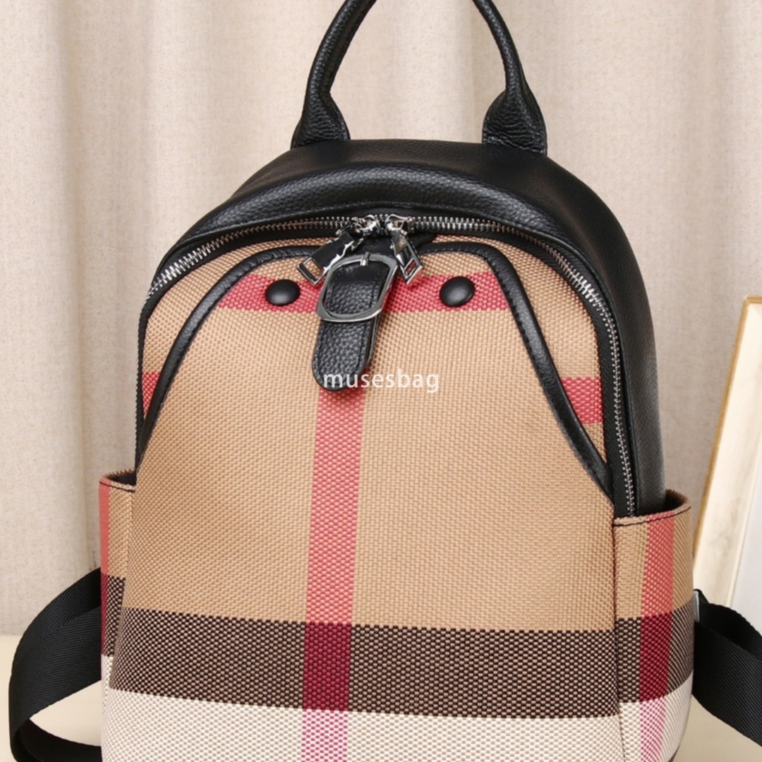 A niche design European and American retro leather canvas backpack women's new daily travel backpack commuting essential crossbody bag handbag
